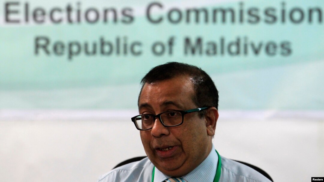 Maldives Election Commissioner Fuwad Thowfeek speaks during a news conference in Male, October 18, 2013. 