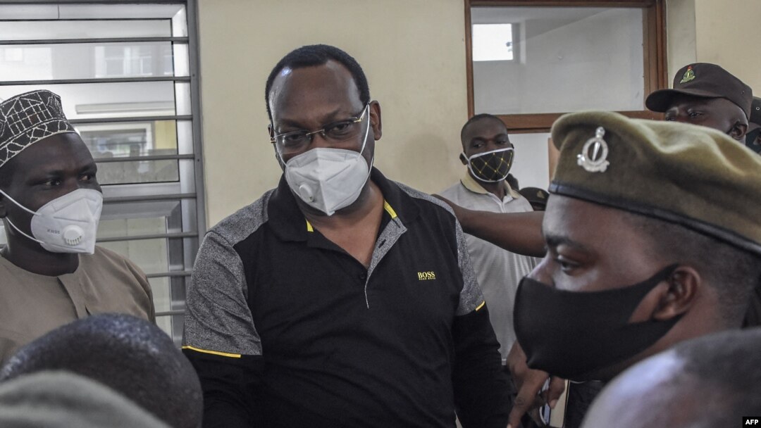 FILE - Tanzania Chadema party chairman Freeman Mbowe stand in the dock at Kisutu Resident Magistrate's Court in Dar es Salaam on Aug, 06, 2021. 
