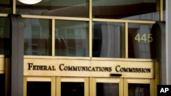 FILE - This June 19, 2015, photo shows the Federal Communications Commission building in Washington.