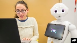 SoftBank Group, in collaboration with SoftBank Robotics America, brings the humanoid robot, Pepper, to students in the San Francisco Unified School District. Students at Galileo Academy of Science and Technology learn how to program robots on Wednesday, D