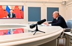 俄羅斯總統普京與中國領導人習近平舉行視頻對話。 （2021年6月28日）