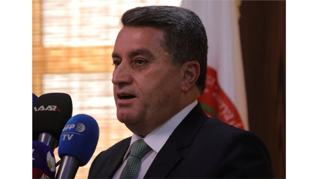 FILE - Abdulkarim Omar, head of the foreign relations commission in the Autonomous Administration, speaks during a news conference in Qamishli, Syria, Sept. 20, 2018.