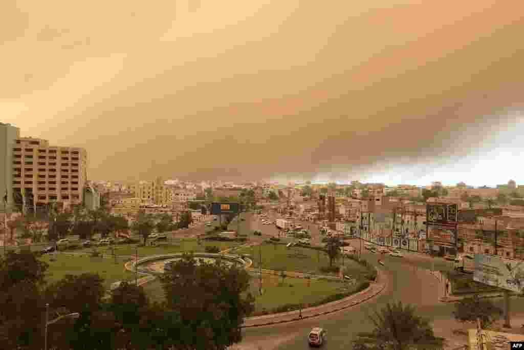 A sand storm approaches Yemen's second city of Aden.