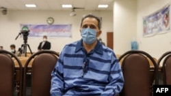 FILE — Jamshid Sharmahd attends the first hearing of his trial in Tehran on Feb. 6, 2022. (Photo by Koosha Mahshid Falah/Mizan News Agency/AFP)