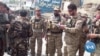 Afghan Commander Relocated to US Hopes to Reunite His Family