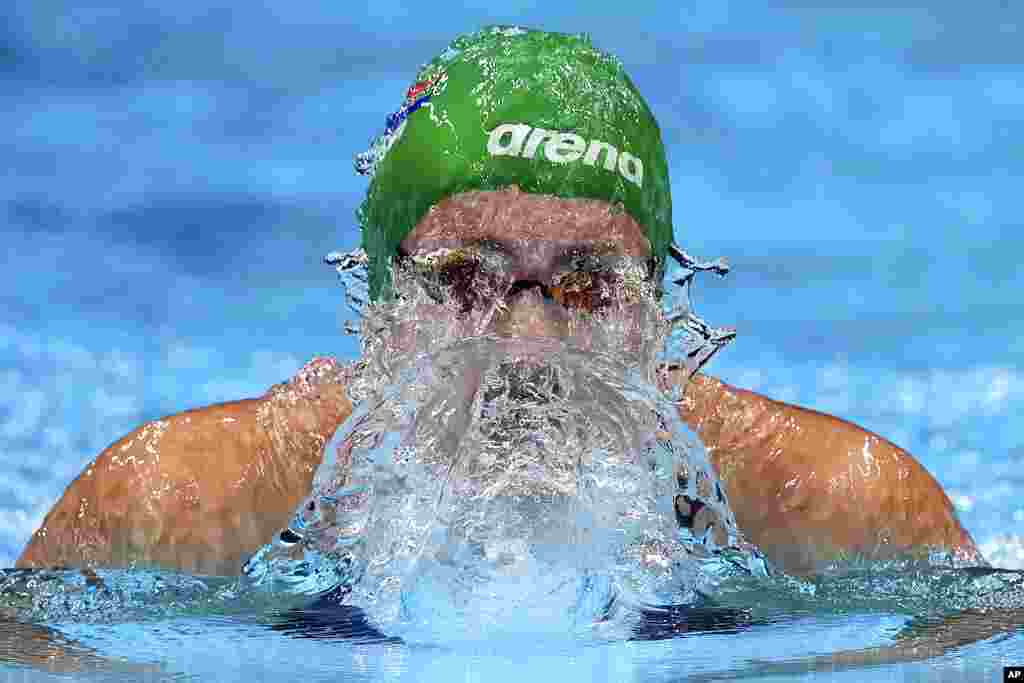Tatjana Schoenmaker of South Africa swims in a women's 200-meter breaststroke semifinal at the 2020 Summer Olympics, Thursday, July 29, 2021, in Tokyo, Japan. (AP Photo/Matthias Schrader)