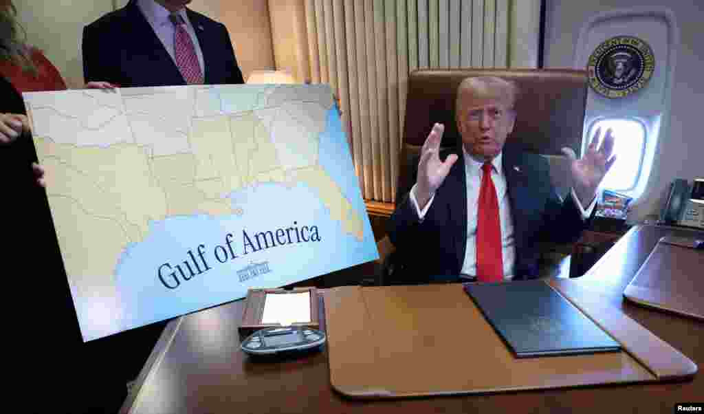 U.S. President Donald Trump speaks to reporters after signing a proclamation renaming the Gulf of Mexico to the Gulf of America, while flying over the gulf aboard Air Force One en route to New Orleans to attend the Super Bowl, Feb. 9, 2025.