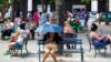 FILE - Users surf the Internet at a Wi-Fi hotspot in Havana, Cuba, Nov. 25, 2015.