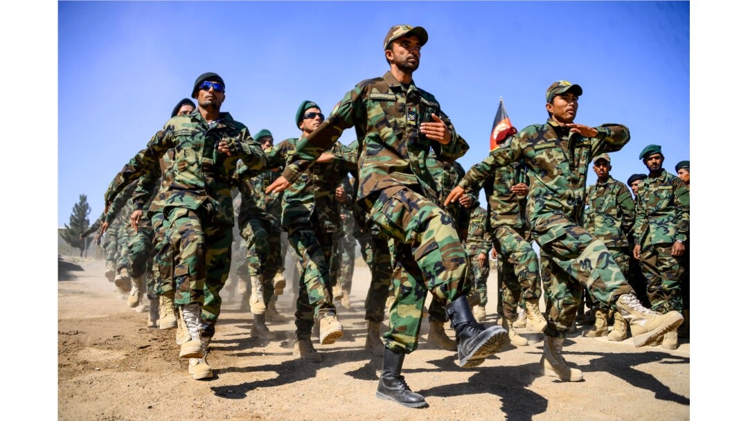 FILE - Afghan National Army soldiers march during a ceremony at a military base in the Guzara district of Herat province, Oct. 11, 2020. (AFP)