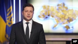 On February 24, 2022, Ukrainian President Volodymyr Zelenskyy addressed the nation and declared martial law. (Ukrainian Presidential Press Office via AP)