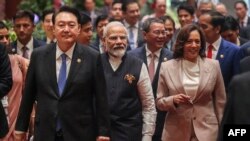 資料照片：2023年9月7日南韓總統尹錫悅（左）、印度總理莫迪（中）、中國國務院總理李強（後右二）、美國副總統賀錦麗（前右）和印尼總統佐科·維多多（後右）抵達東協峰會
