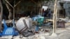 An explosion claimed by a suspected al-Shabab member destroyed this tea shop near a security checkpoint in Mogadishu, Somalia, on Sept. 29, 2023. Somali officials arrested a man believed to be the main arms dealer for al-Shabab militants.