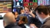 US markets pare losses after Trump pauses tariff on Mexican imports