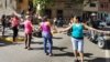Demonstrators protest the scarcity and high cost of food in western Caracas, Venezuela, Dec. 28, 2017. (N. Kolster/VOA)