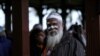 FILE - Aboriginal groups march against planned changes in heritage protection laws, in Perth