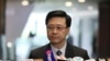 前香港政務司司長李家超2022年4月13日到選舉事務處提交參選特首提名。（路透社照片）