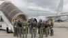 Colombia sends air force planes to bring home migrants deported from the US