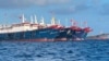 In this photo provided by the National Task Force-West Philippine Sea, Chinese vessels are moored at Whitsun Reef, South China Sea on March 27, 2021. The Philippine government said Wednesday, March 31, that more than 250 Chinese vessels it believes…
