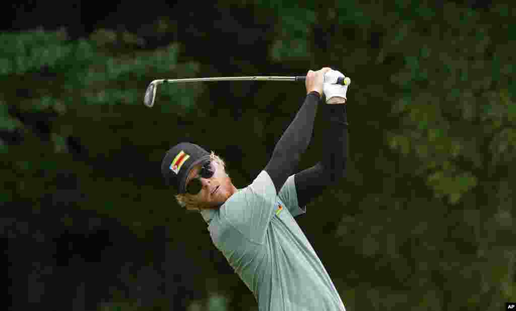 Scott Vincent of Zimbabwe XX watches his tee shot on the fourth hole during the second round of the men's golf event at the 2020 Summer Olympics on Friday, July 30, 2021, at the Kasumigaseki Country Club in Kawagoe, Japan. (AP Photo/Matt York)
