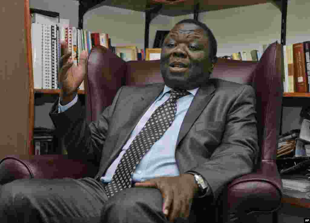 Morgan Tsvangirai speaks at his home a day after the historic signing of the power sharing deal which saw him becoming the new Prime Minister of Zimbabwe in Harare Tuesday, Sept, 16, 2008. 