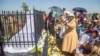 It's the holidays in Zimbabwe. Time to celebrate by unveiling a family tombstone