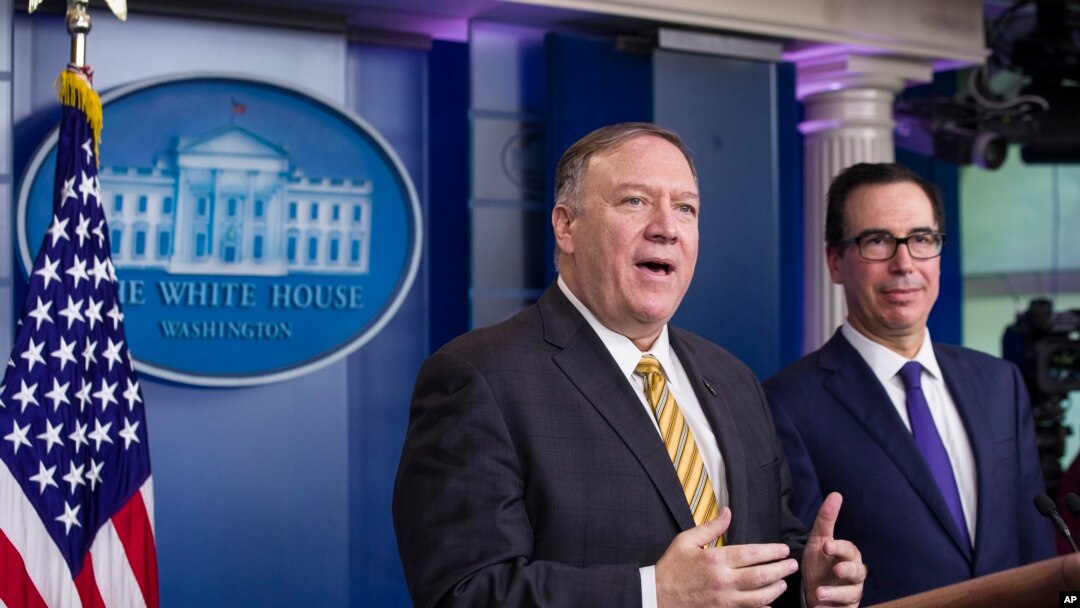 FILE - U.S. Secretary of State Mike Pompeo and Treasury Secretary Steve Mnuchin speak during a briefing at the White House, in Washington, Sept. 10, 2019. 
