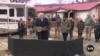Trump visits scenes of natural disasters in California, North Carolina 