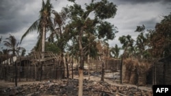 FILE - The remains of a burned home is seen in the recently attacked village of Aldeia da Paz, in the Cabo Delgado province, northern Mozambique, Aug. 24, 2019. Mozambique on April 6, 2023, legalized the involvement of local militias in the fight against Islamist militants.