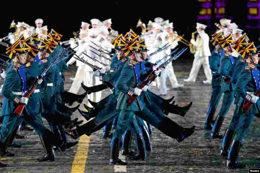 Members of the Guard of Honor of the Presidential regiment perform during the International Military Orchestra Music Festival "Spasskaya Tower" in Red Square in Moscow, Russia, Aug. 26, 2017.