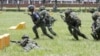 資料照片: 2024年6月28日手持槍支台灣軍人參加訓練