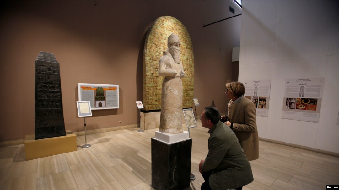 Participants in the Antiquities Protection Workshop look a King Shalmaneser III statue, while learning to counter heritage crimes and trafficking of artifacts, at the Iraqi National Museum in Baghdad, Iraq, Jan. 23, 2019. 