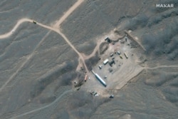 FILES - This file handout satellite image provided by Maxar Technologies on Jan. 28, 2020, shows an overview of Iran's Natanz nuclear facility, south of the capital Tehran.