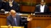 FILE - South African President Jacob Zuma answers questions from opposition party members during a parliamentary session in Cape Town, South Africa, March. 17, 2016. On Tuesday, Zuma survived a move by his own party to oust him as president.