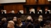 Hakim Nawaf Salam, presiden Mahkamah Internasional (ICJ) memimpin Mahkamah Internasional (ICJ), di Den Haag, Belanda 24 Mei 2024, saat mengeluarkan putusan mengenai permintaan Afrika Selatan untuk memerintahkan penghentian serangan Israel di Rafah di Gaza. (REUTERS/Johanna Geron)