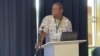 Charles Chikunda, UNESCO’s officer for climate education in southern Africa, speaks in Pretoria, South Africa, Dec. 3, 2024.