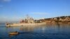 Italian ship carrying migrants picked up offshore reaches Albania