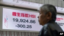 香港股市2月3日開始蛇年第一個交易日。（美聯社照片）