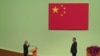 China's Xi swears in new leader of casino hub Macao