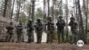 Ukrainian women juggle military service and civilian life